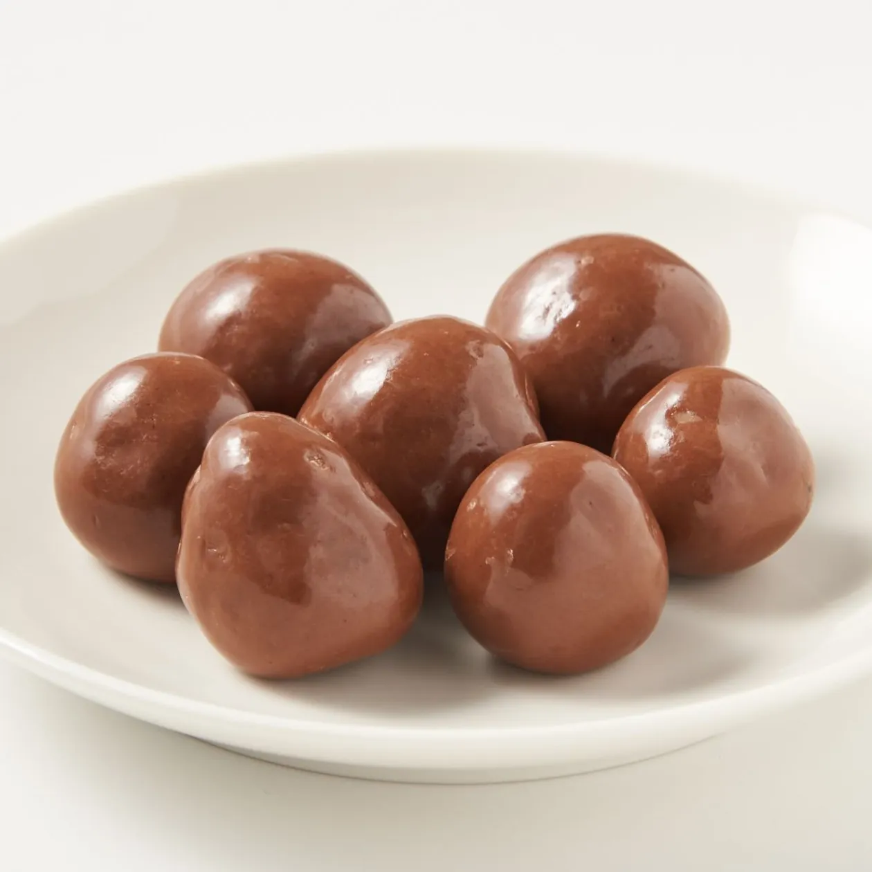 Chocolat Et Bonbons^Muji Frambroises enrobées de chocolat au lait